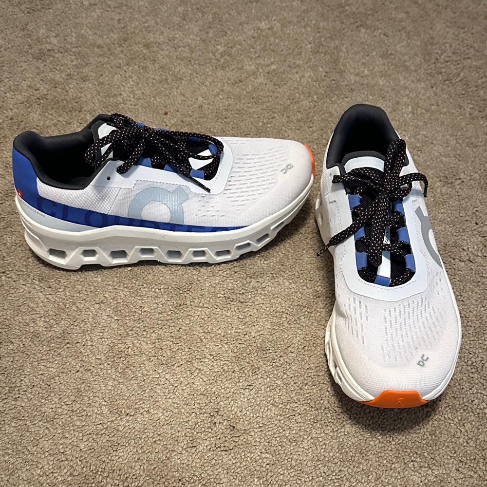 On Running White and Blue Athletic Sneakers